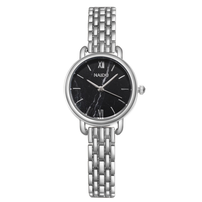 Elegant ladies watch on a bracelet with a stone motif.