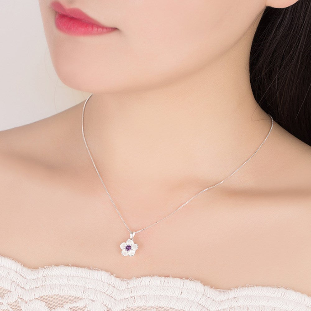 Silver necklace with a flower pendant