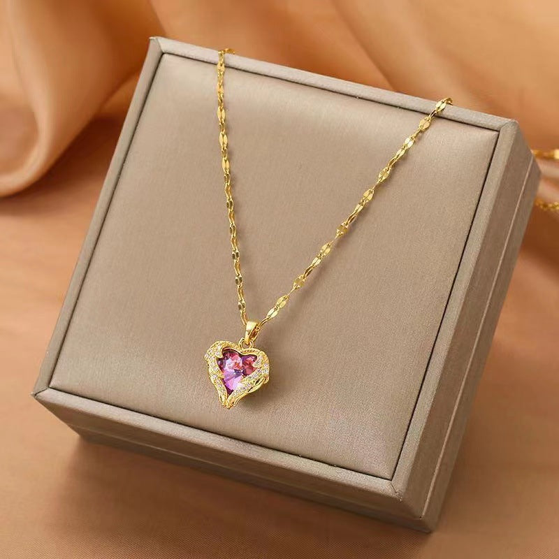 Necklace with a heart-shaped pendant with zircons