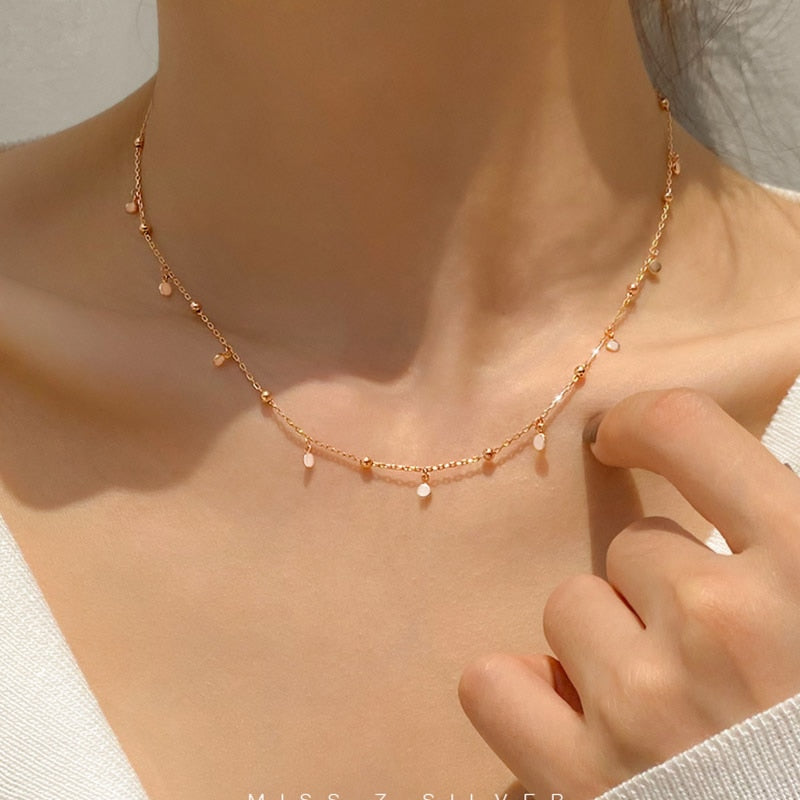 Necklace with small pendants