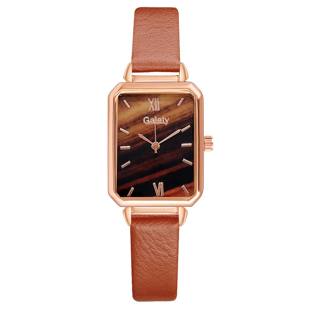 Elegant ladies watch on a strap with a stone motif