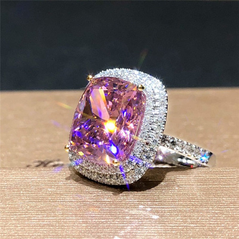 Ring with zircons and a stone