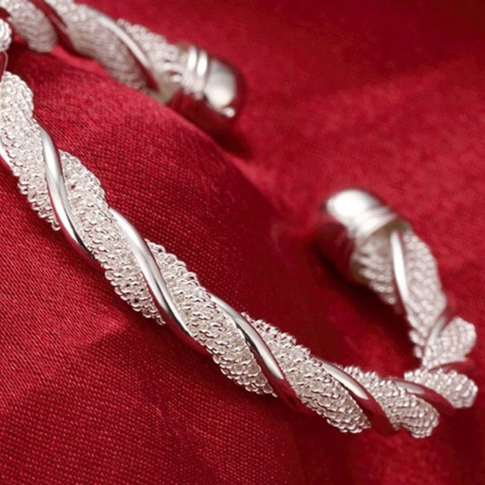 Silver bracelet with a weave