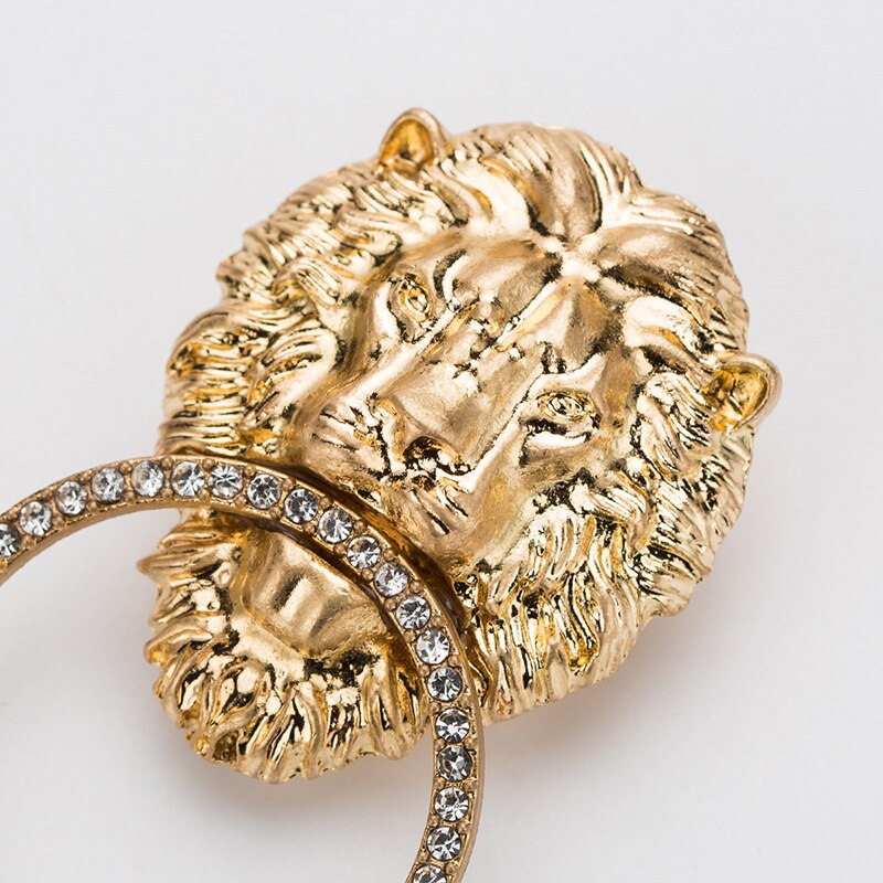 Earrings with a lion motif