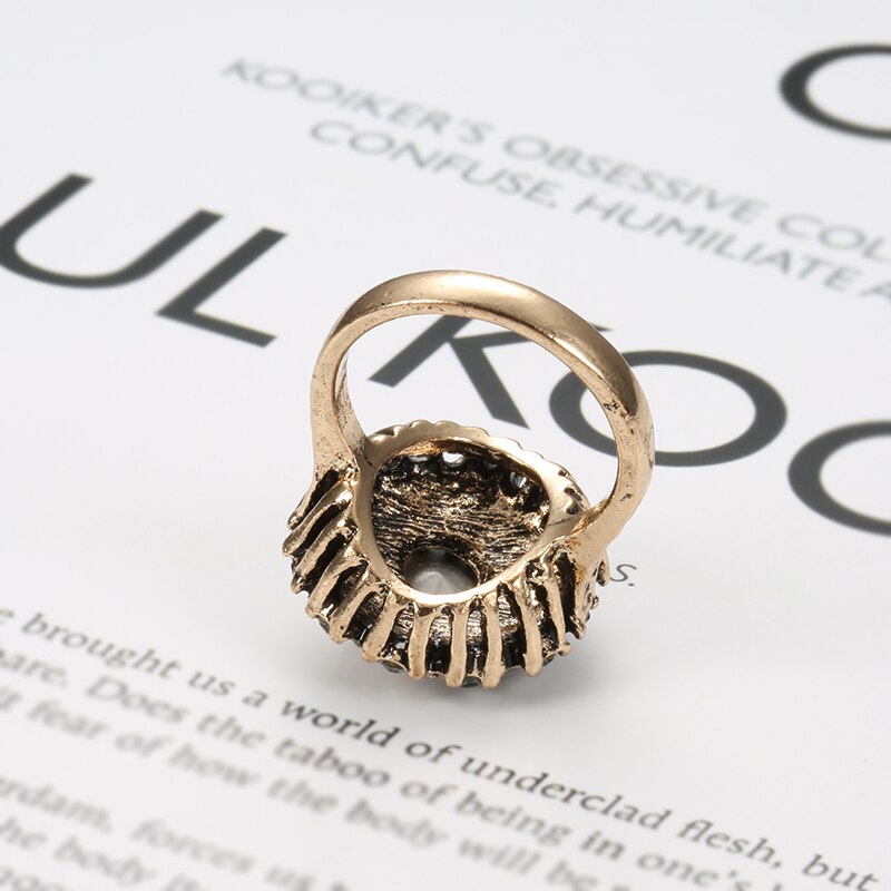 Ring with a black stone