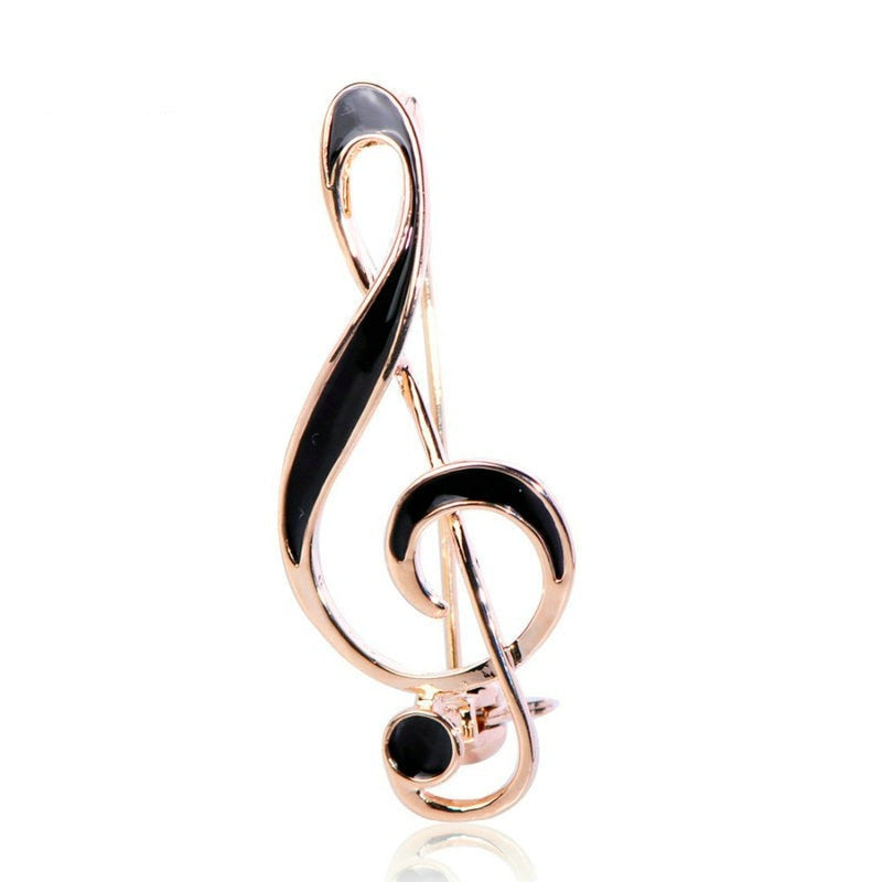 Treble clef brooch
