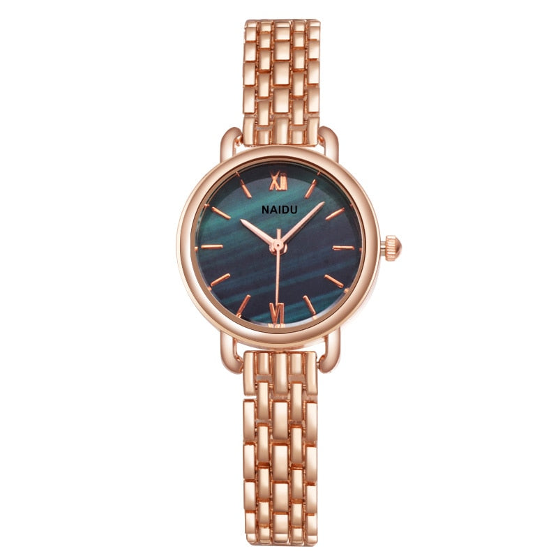 Elegant ladies watch on a bracelet with a stone motif.