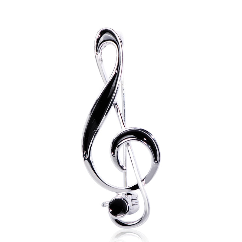 Treble clef brooch