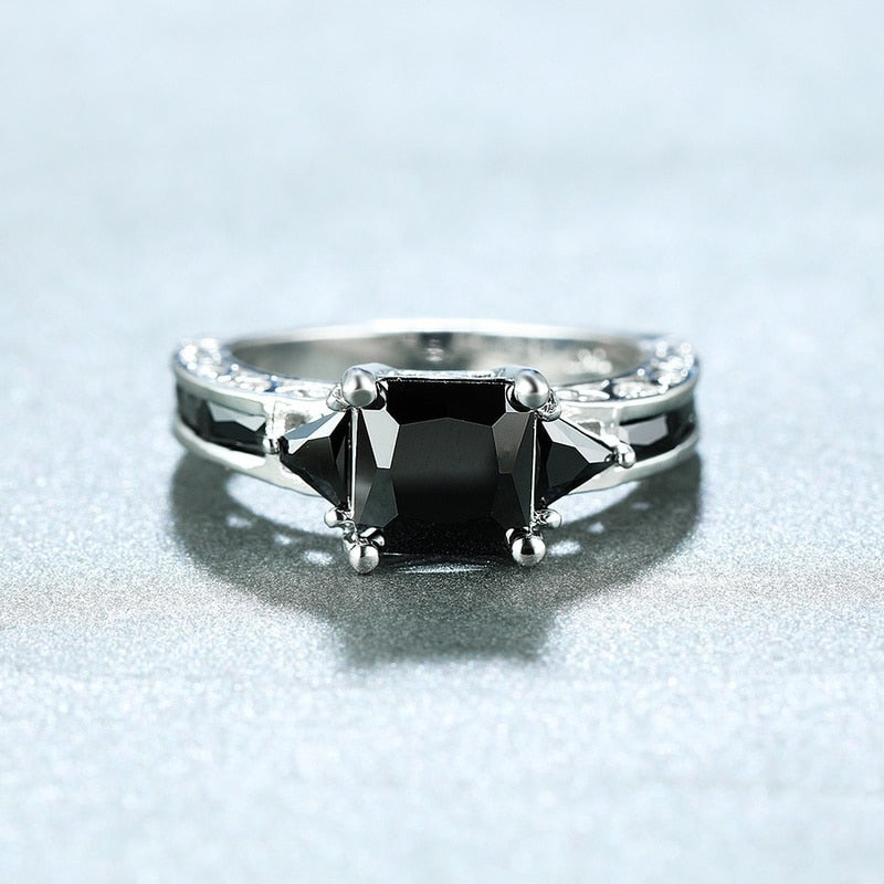 Ring with black zircons