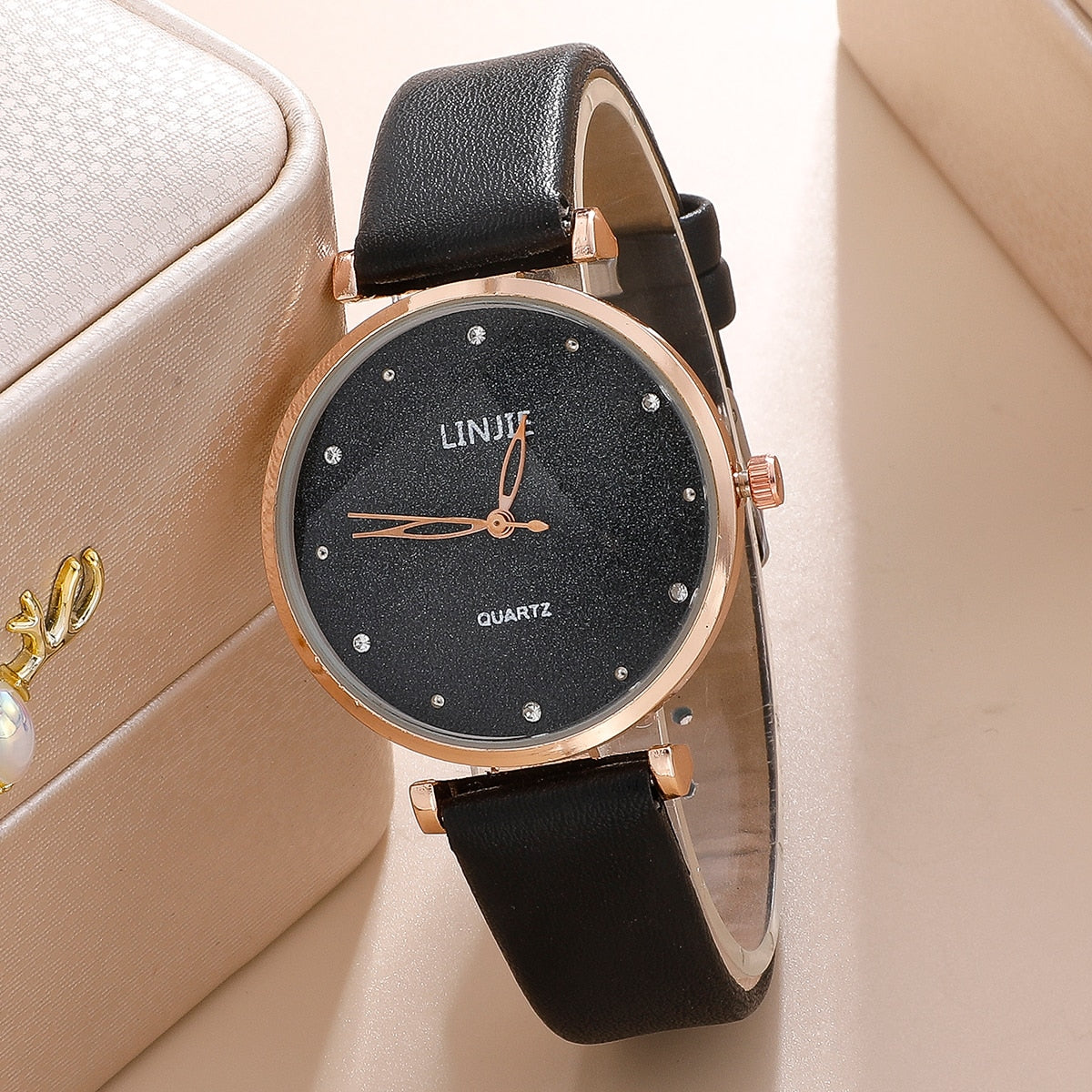 Ladies watch with a glittery dial