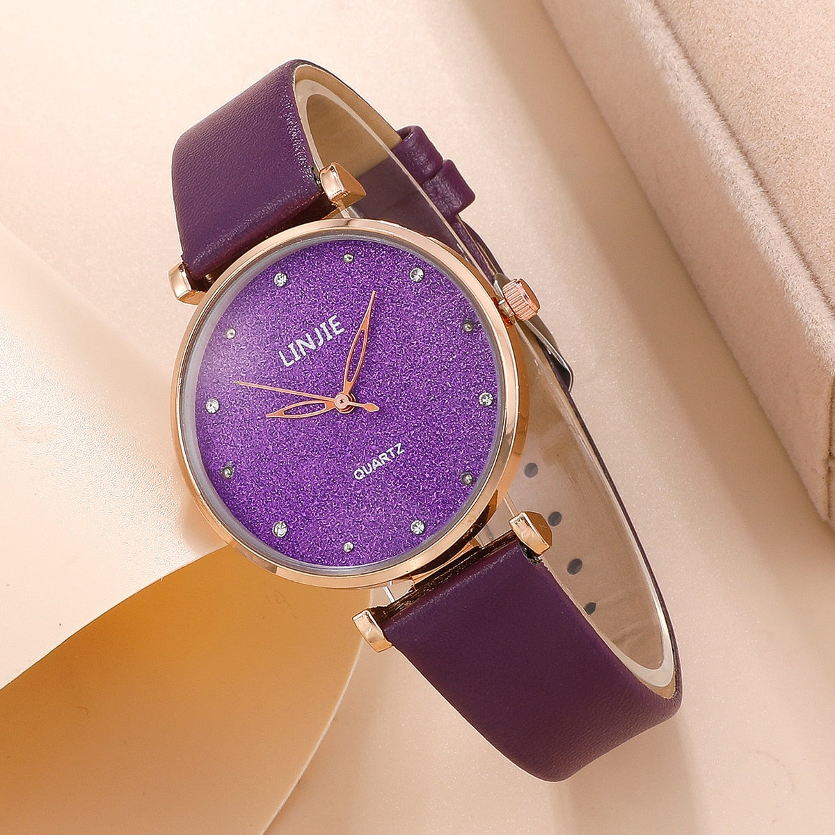 Ladies watch with a glittery dial