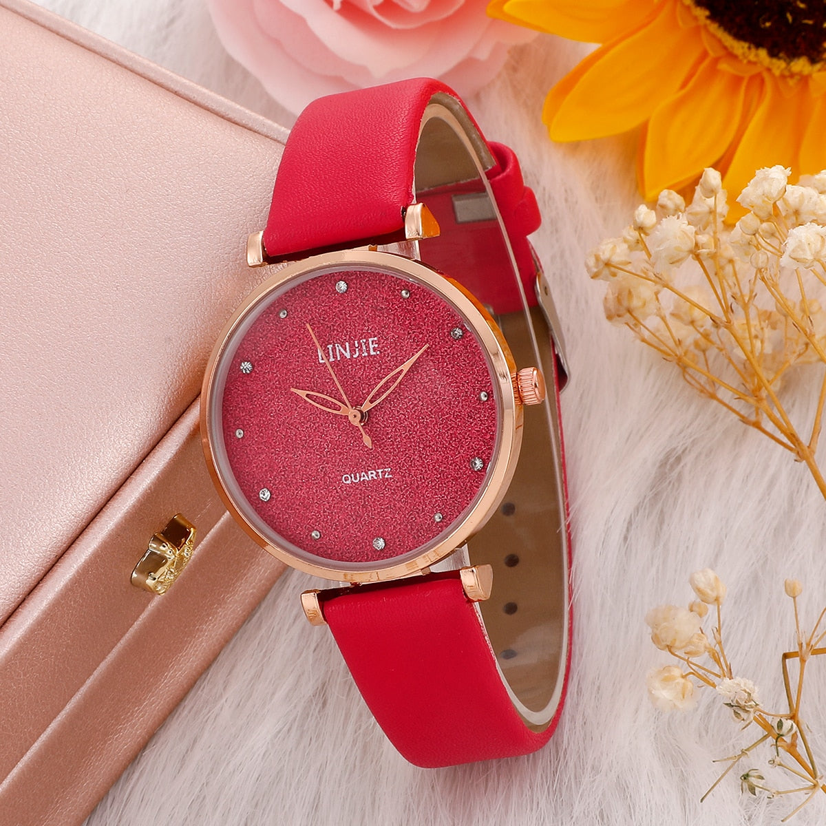 Ladies watch with a glittery dial