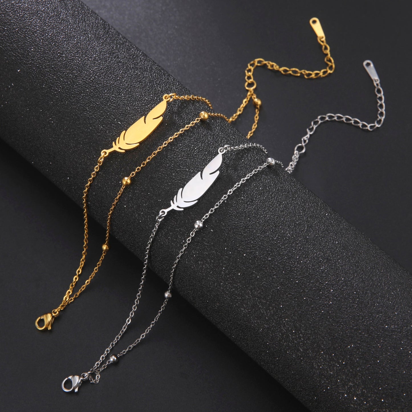 Ankle bracelet with a feather
