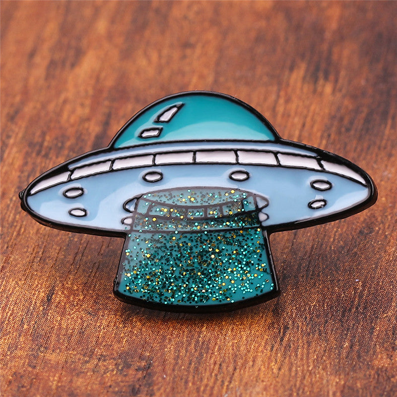 UFO pin with glitter