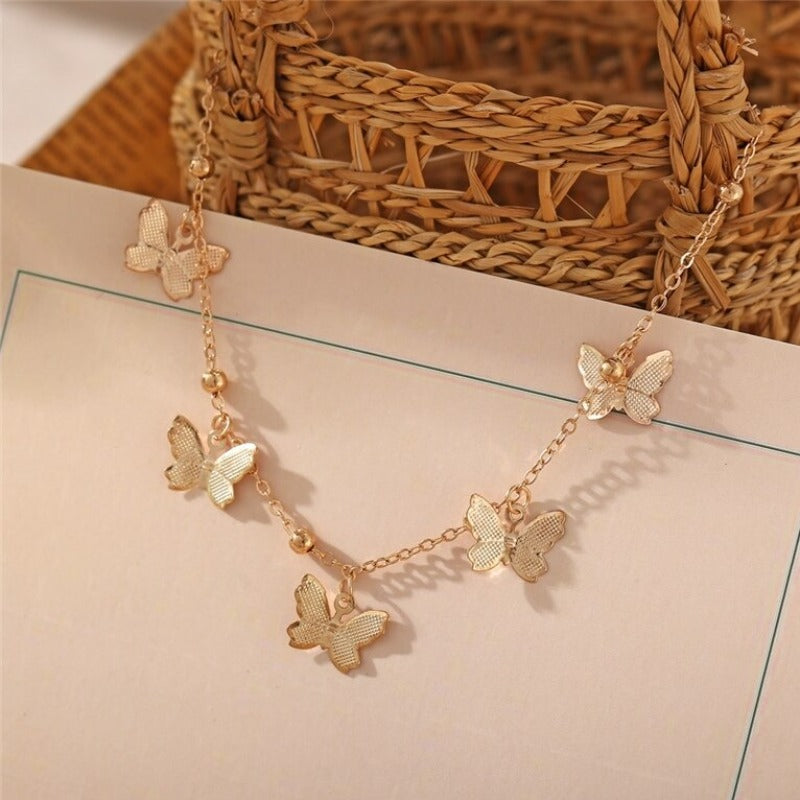 Ankle bracelet with butterfly pendants