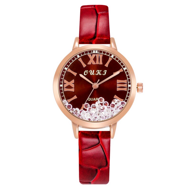 Women's watch with decorative crystals on the dial
