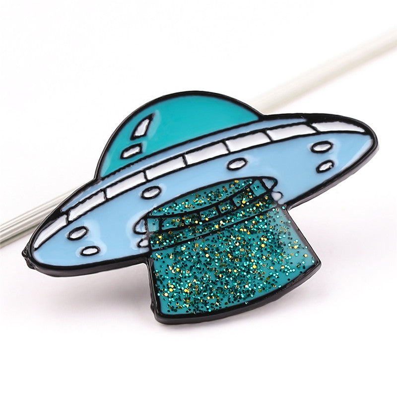 UFO pin with glitter