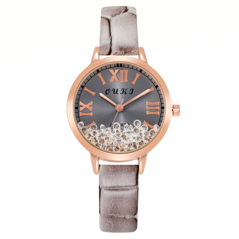 Women's watch with decorative crystals on the dial