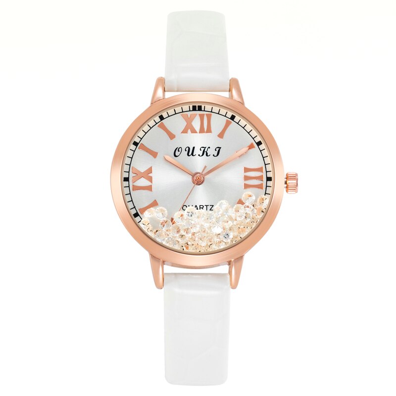 Women's watch with decorative crystals on the dial