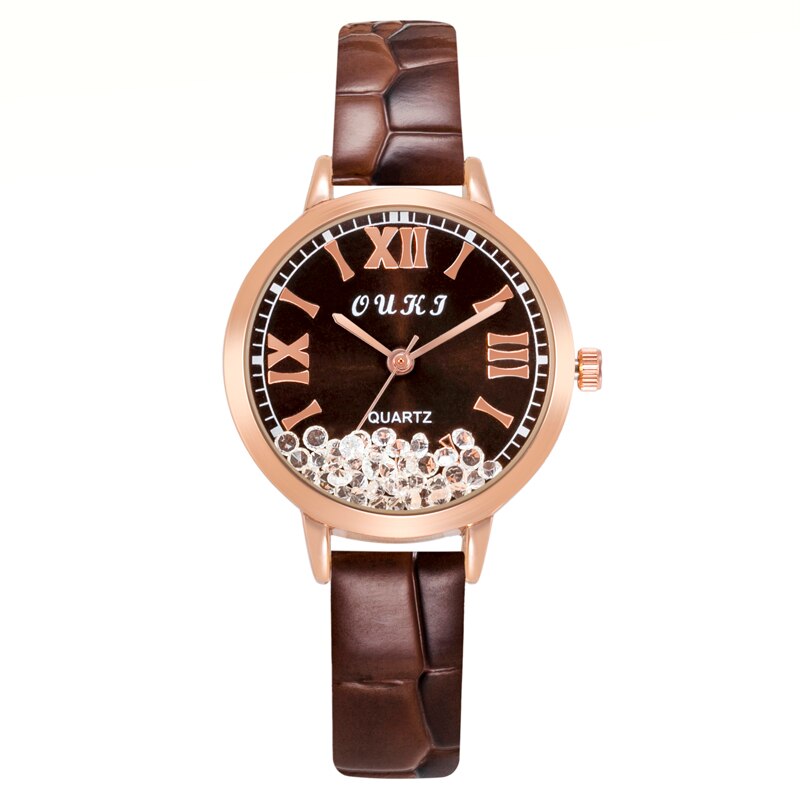 Women's watch with decorative crystals on the dial