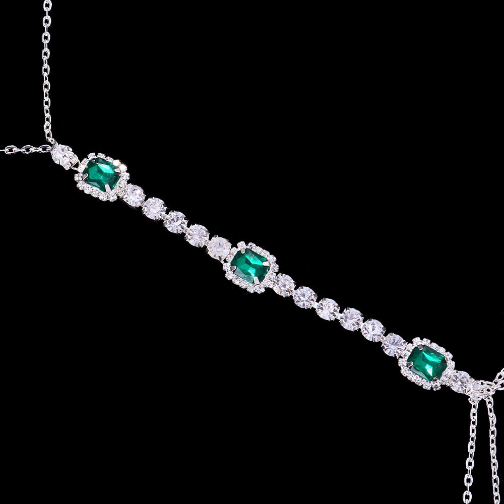 Chest chain with zircons and green eyes