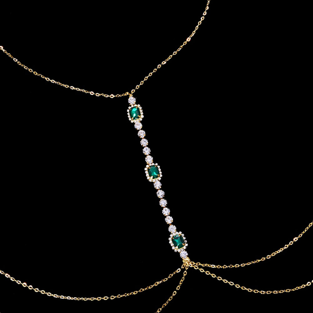 Chest chain with zircons and green eyes