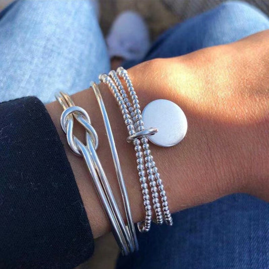 A set of bracelets with a pendant