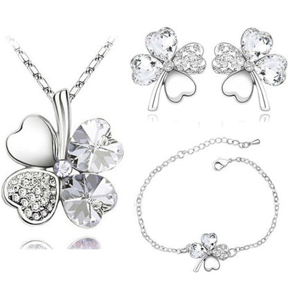 A set of jewelry with a four-leaf clover