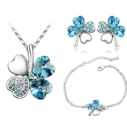 A set of jewelry with a four-leaf clover