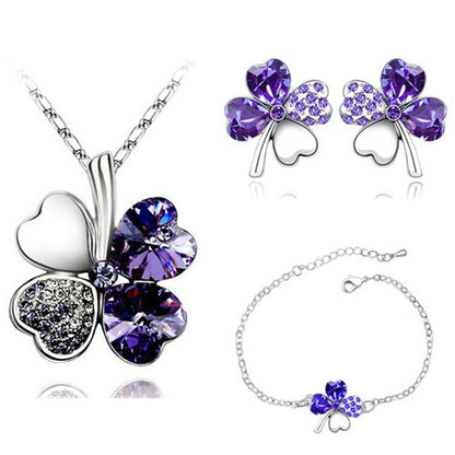 A set of jewelry with a four-leaf clover