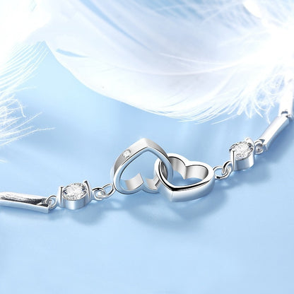 Silver bracelet with hearts