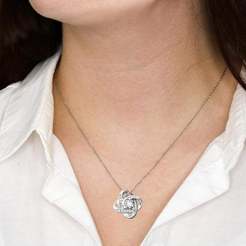 Necklace with a shiny pendant