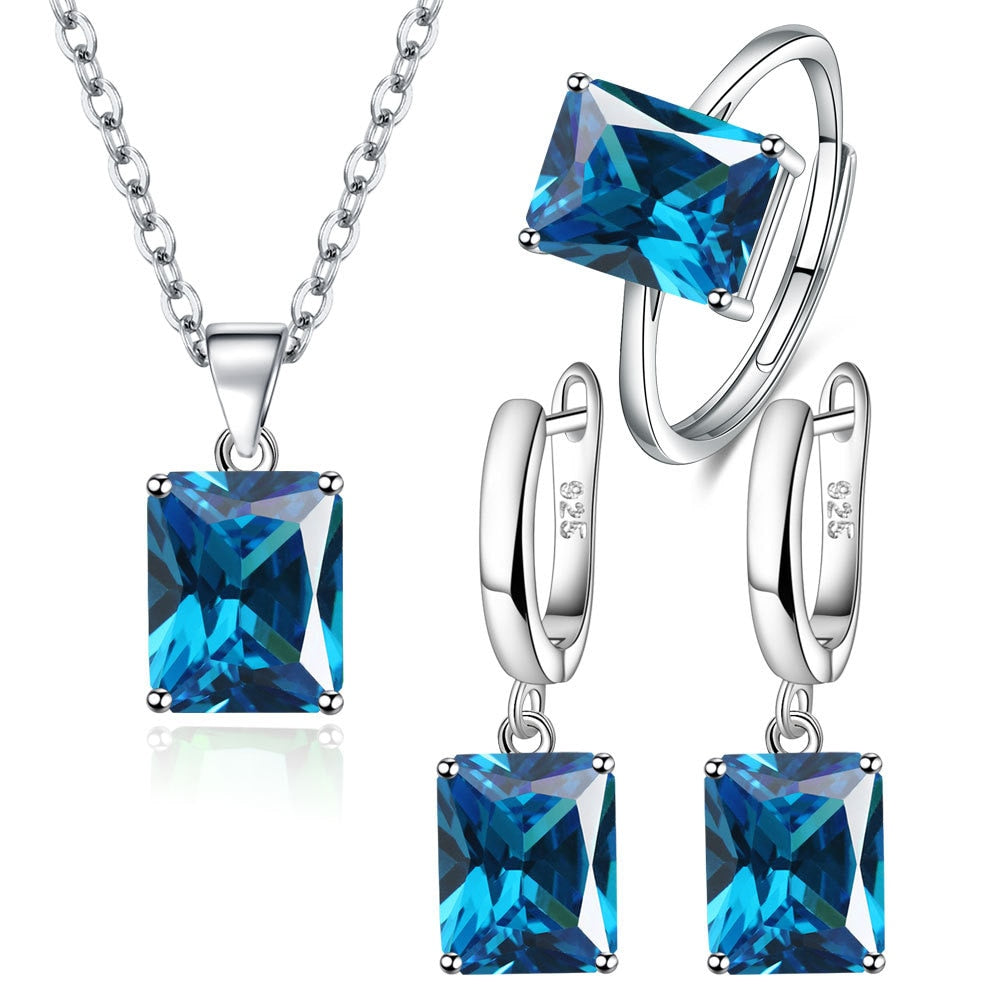 Silver jewelry set with colorful zircons