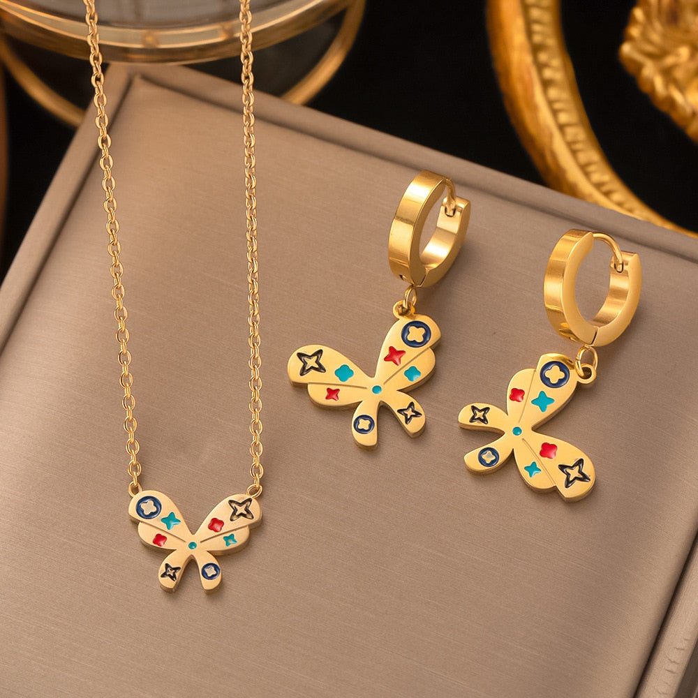 A set of jewelry with butterflies