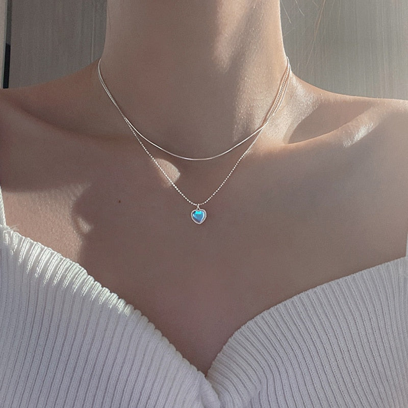 Delicate necklace with a heart