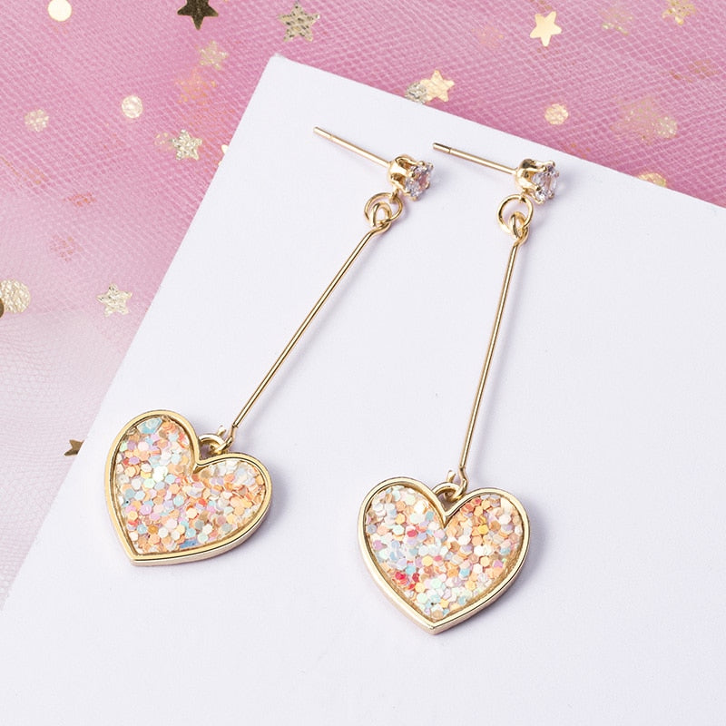 Heart-shaped hanging earrings