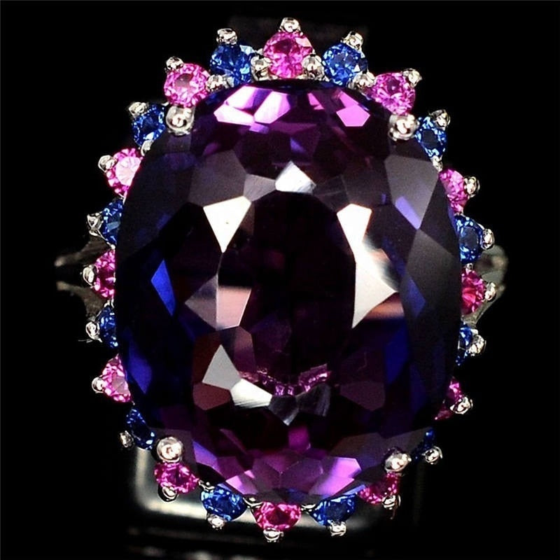 Ring with a purple stone