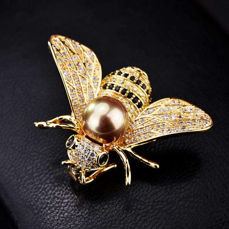 Brooch with a pearl imitation - bee