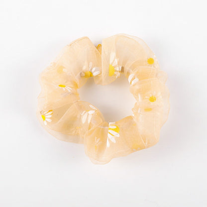 Girl's scrunchie hair tie with flower motif