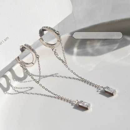 Silver earrings with a chain