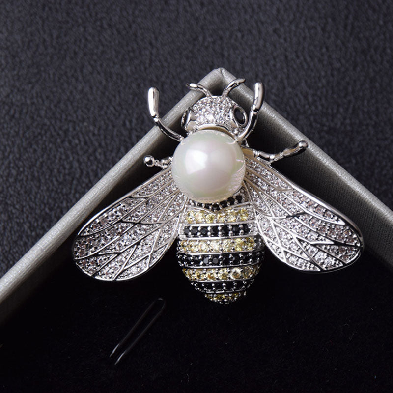 Brooch with a pearl imitation - bee