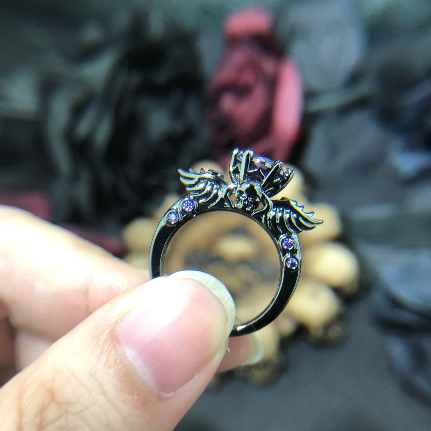 Black ring with wing motif