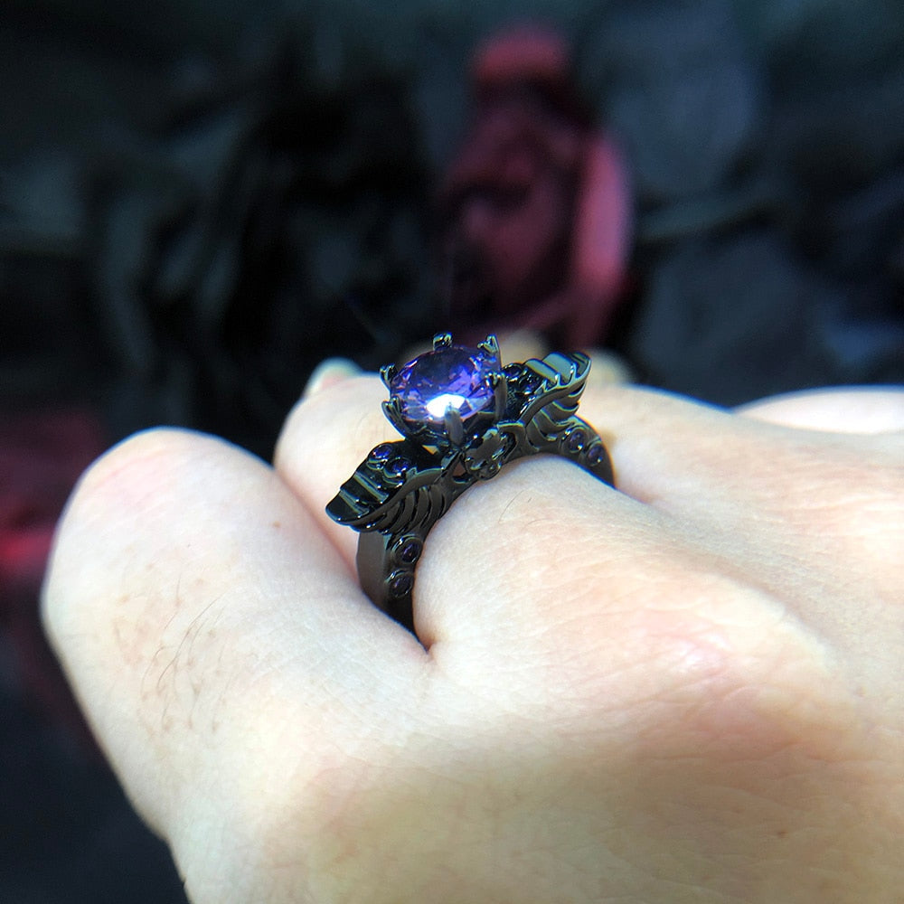 Black ring with wing motif