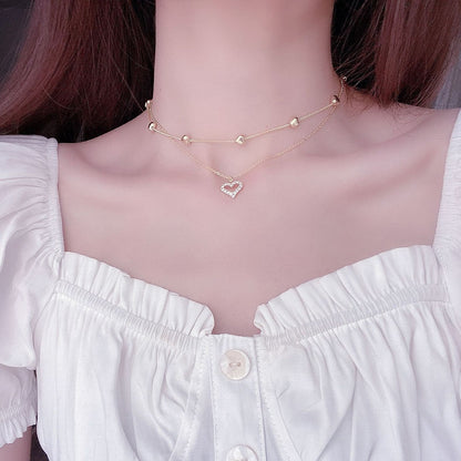 Double necklace with a heart