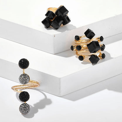 Ring with black stones