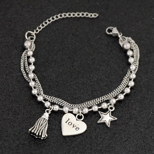 Silver bracelet with pendants