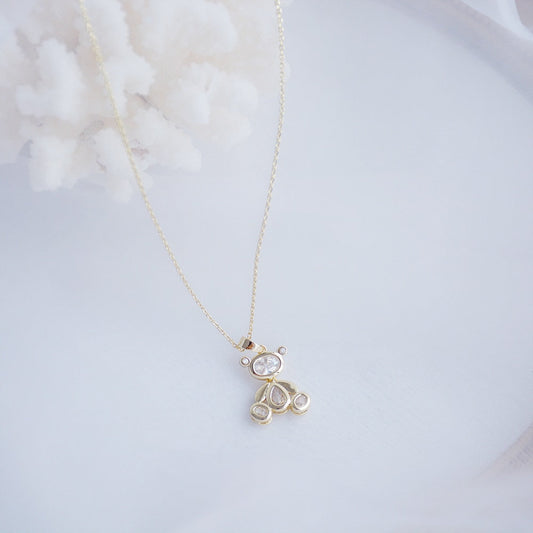 Necklace with a teddy bear pendant