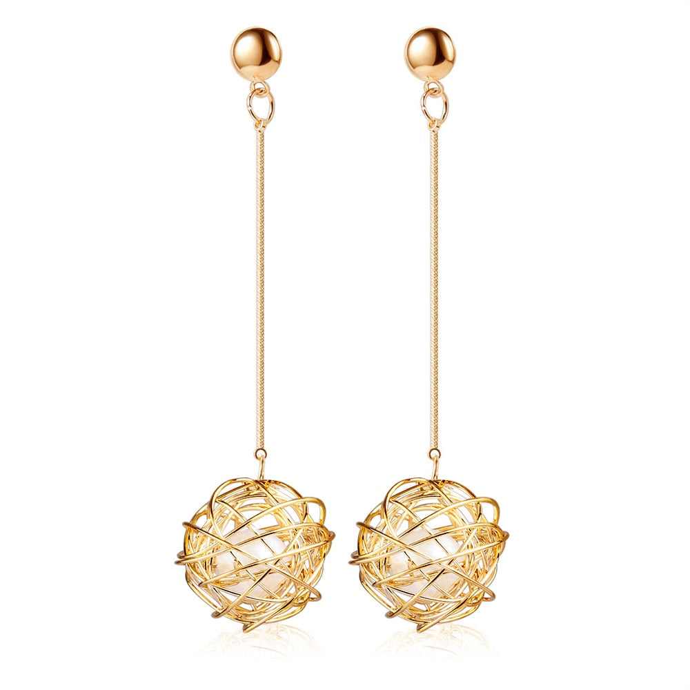 Hanging ball earrings