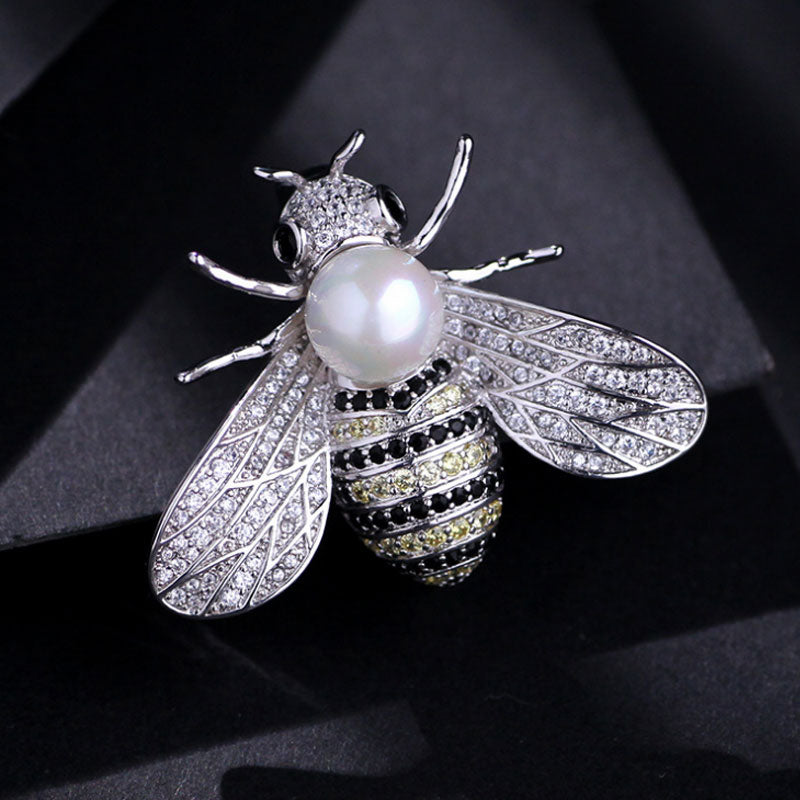 Brooch with a pearl imitation - bee