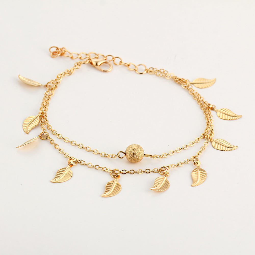 Ankle bracelet with leaf-shaped pendants